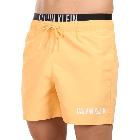 Costume de baie pentru bărbați Calvin Klein portocaliu (KM0KM00992-SAN)
