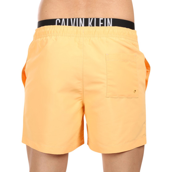 Costume de baie pentru bărbați Calvin Klein portocaliu (KM0KM00992-SAN)