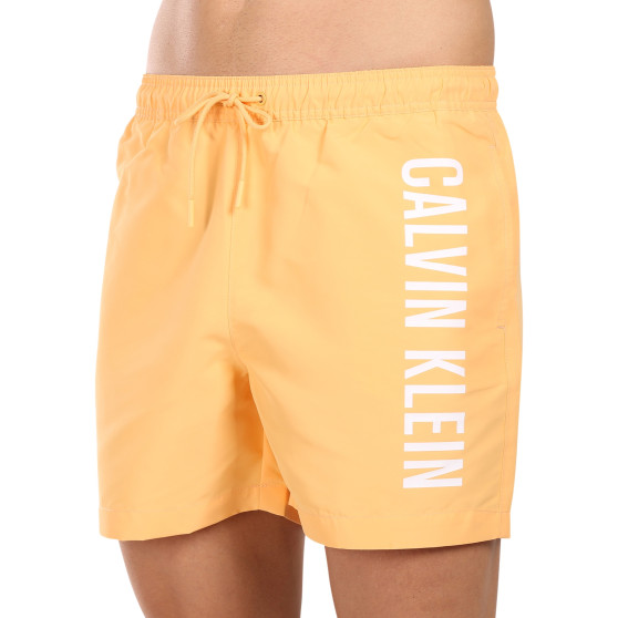 Costume de baie pentru bărbați Calvin Klein portocaliu (KM0KM01004-SAN)